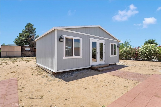7720 Windsor Ave, Hesperia, CA 92345 - back of property with an outbuilding and french doors