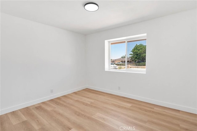 7720 Windsor Ave, Hesperia, CA 92345 - empty room with light wood-style floors