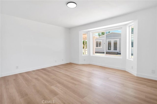 7720 Windsor Ave, Hesperia, CA 92345 - spare room featuring light wood-type flooring and baseboards