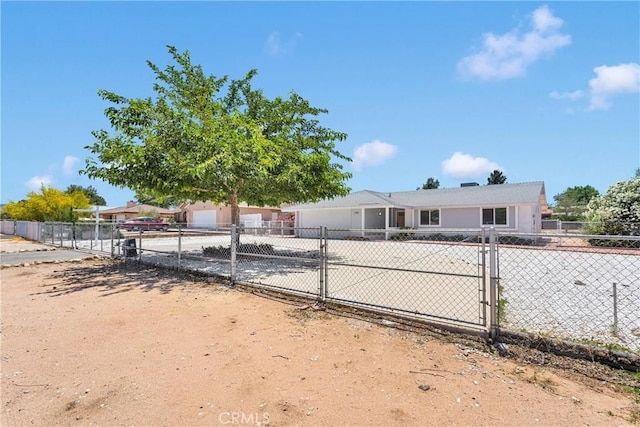 7720 Windsor Ave, Hesperia, CA 92345 - view of front of house with an attached garage and a gate