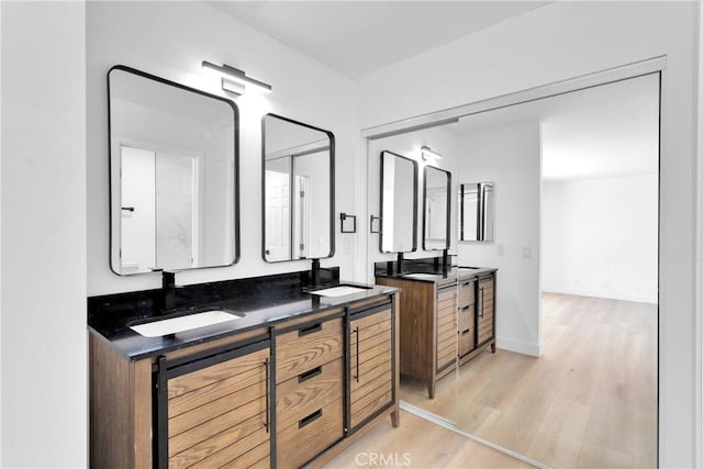 7720 Windsor Ave, Hesperia, CA 92345 - bathroom with wood finished floors and double vanity