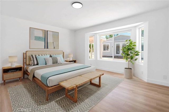7720 Windsor Ave, Hesperia, CA 92345 - bedroom with wood finished floors and baseboards