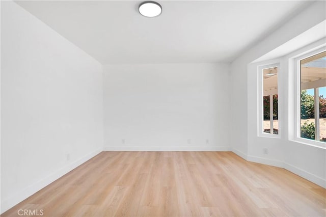 7720 Windsor Ave, Hesperia, CA 92345 - empty room with light wood-style floors and baseboards