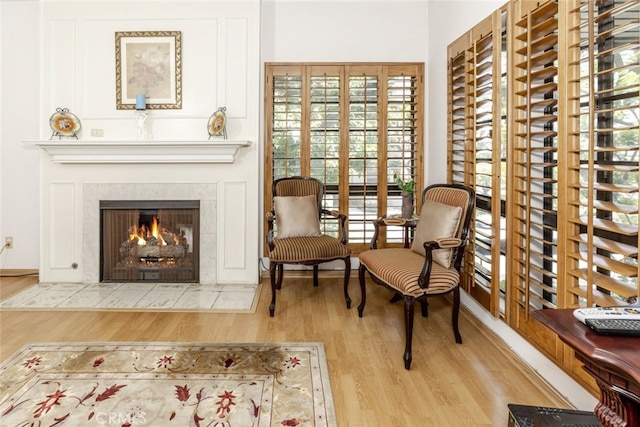 1313 Valley View Rd Unit 202, Glendale, CA 91202 - living area with wood finished floors and a tile fireplace