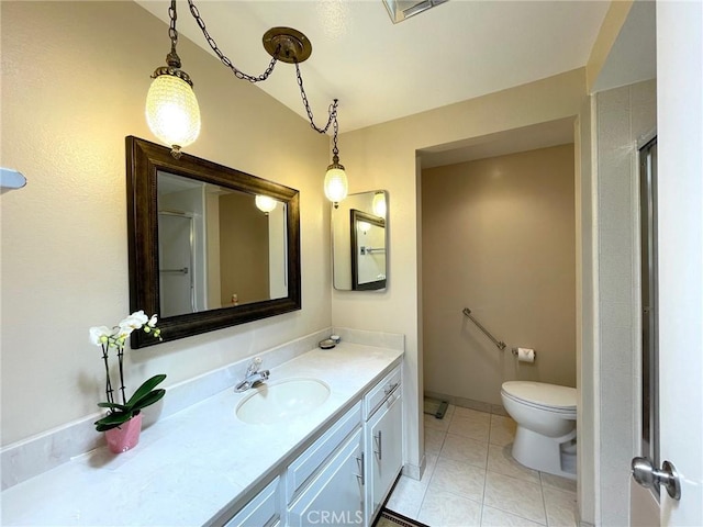 636 NW Avenida Sevilla # O, Laguna Woods, CA 92637 - bathroom with vanity, tile patterned flooring, and a shower with door
