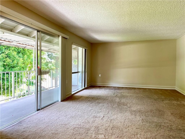 636 NW Avenida Sevilla # O, Laguna Woods, CA 92637 - carpeted spare room with a textured ceiling and baseboards