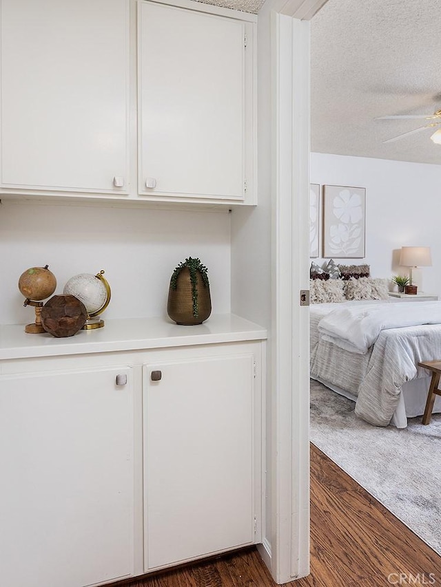 1626 S Mayflower Ave Unit A, Monrovia, CA 91016 - detailed view of wood finished floors, ceiling fan, and a textured ceiling