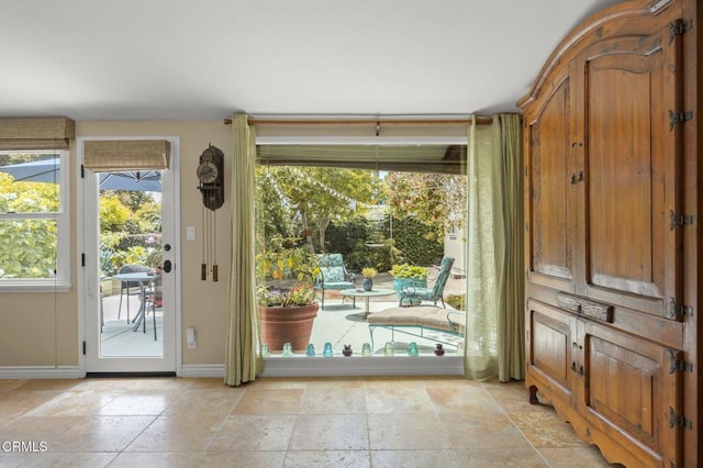 401 S Brent St, Ventura, CA 93003 - doorway with stone tile flooring and baseboards