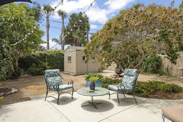 401 S Brent St, Ventura, CA 93003 - fenced backyard with a patio and a storage unit
