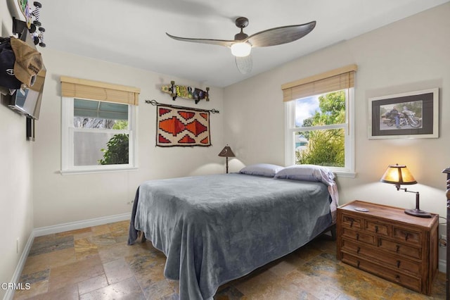 401 S Brent St, Ventura, CA 93003 - bedroom with stone tile floors and ceiling fan