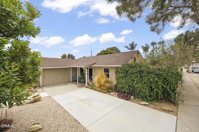 401 S Brent St, Ventura, CA 93003 - view of front of property featuring a shingled roof, concrete driveway, and stucco siding
