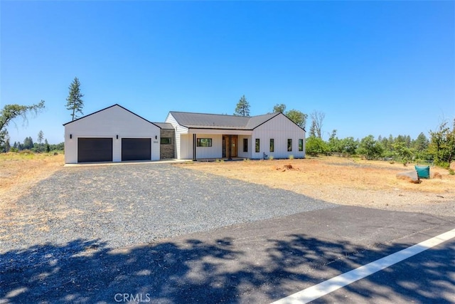 866 Central Park Dr, Paradise, CA 95969 - modern farmhouse style home featuring a garage, driveway, and board and batten siding