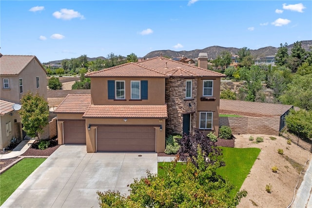 23812 Cook Ct, Wildomar, CA 92595 - mediterranean / spanish house with stucco siding, a tile roof, concrete driveway, a chimney, and a mountain view