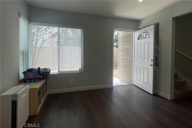 23330 Dover Ln Unit 94, Yorba Linda, CA 92887 - entrance foyer featuring dark wood finished floors and stairway