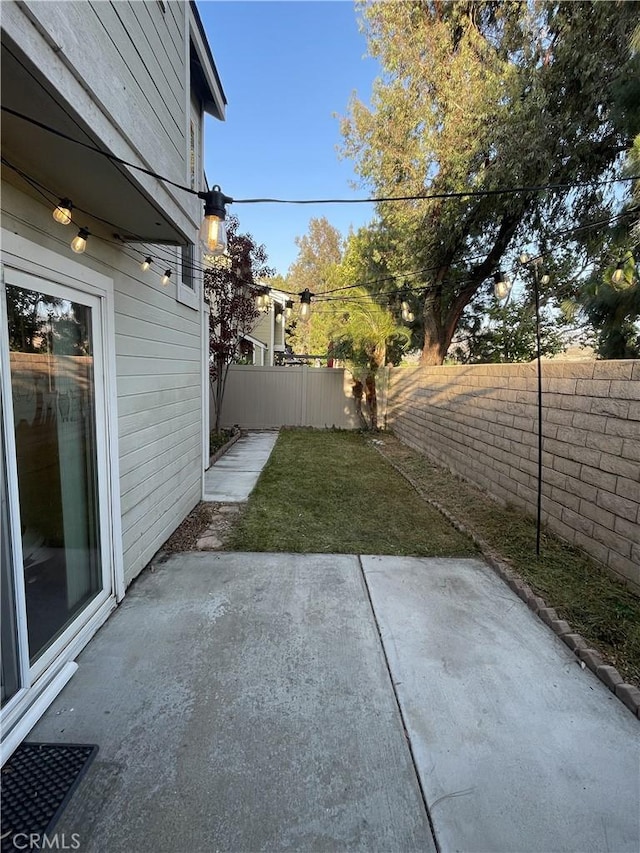 23330 Dover Ln Unit 94, Yorba Linda, CA 92887 - fenced backyard featuring a patio area