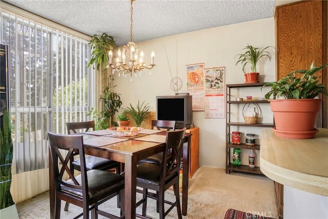 13903 Sherman Way Unit 8, Van Nuys, CA 91405 - dining space with light colored carpet, a chandelier, and a textured ceiling