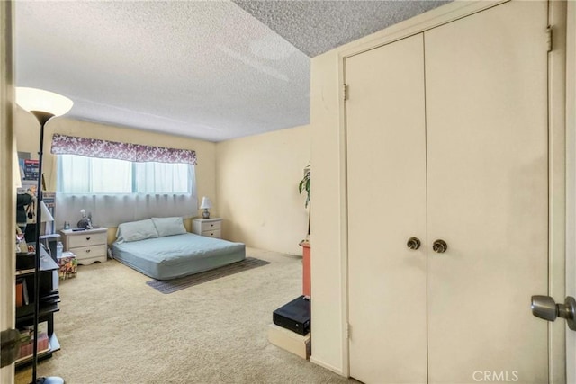 13903 Sherman Way Unit 8, Van Nuys, CA 91405 - carpeted bedroom featuring a textured ceiling and a closet