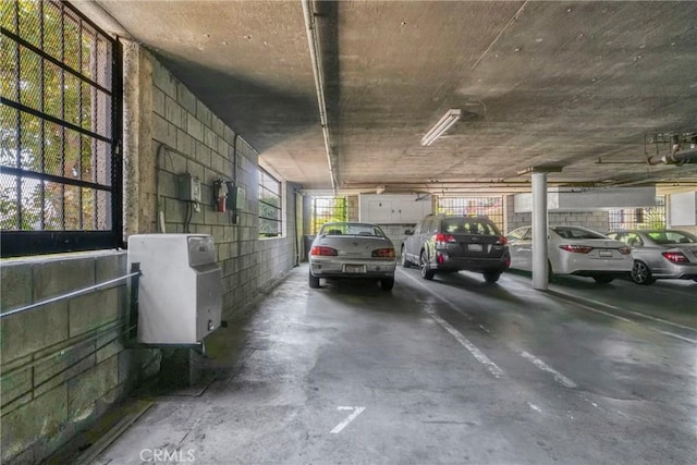 13903 Sherman Way Unit 8, Van Nuys, CA 91405 - parking garage featuring concrete block wall