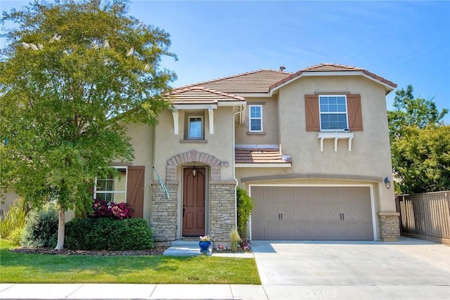 44837 Checkerbloom Dr, Temecula, CA 92592 - view of front of house featuring stucco siding, a garage, a tiled roof, concrete driveway, and stone siding
