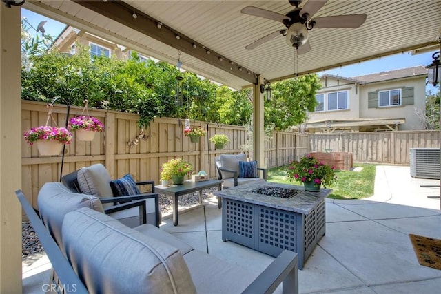 44837 Checkerbloom Dr, Temecula, CA 92592 - fenced backyard with an outdoor living space with a fire pit, a patio, and ceiling fan