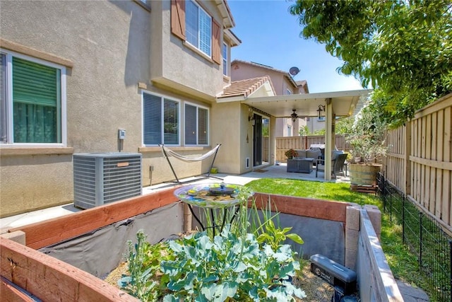 44837 Checkerbloom Dr, Temecula, CA 92592 - fenced backyard with an outdoor living space, a patio area, and ceiling fan