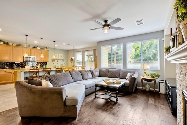 44837 Checkerbloom Dr, Temecula, CA 92592 - living room featuring ceiling fan, recessed lighting, and hardwood / wood-style floors