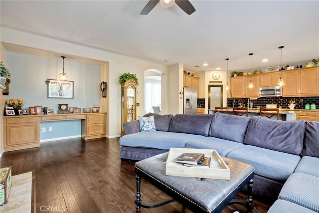 44837 Checkerbloom Dr, Temecula, CA 92592 - living room featuring arched walkways, ceiling fan, dark wood-type flooring, and recessed lighting