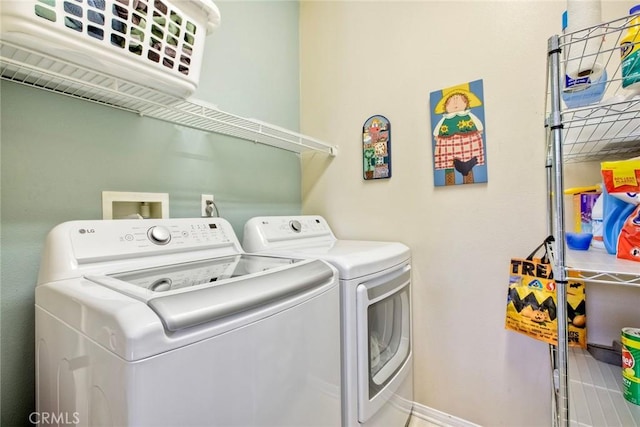 44837 Checkerbloom Dr, Temecula, CA 92592 - laundry area with washing machine and dryer and baseboards