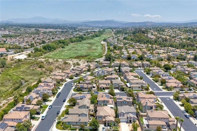 44837 Checkerbloom Dr, Temecula, CA 92592 - aerial view of property and surrounding area featuring a mountain backdrop and nearby suburban area