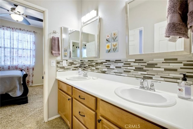 44837 Checkerbloom Dr, Temecula, CA 92592 - ensuite bathroom with double vanity, decorative backsplash, and a ceiling fan