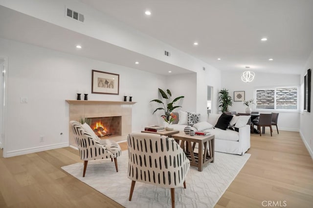 1440 Riviera Dr, Pasadena, CA 91107 - living room featuring light wood-style flooring, a fireplace, and recessed lighting