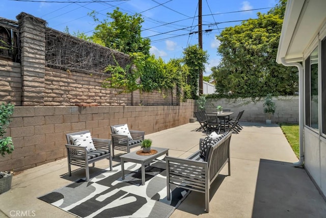 1440 Riviera Dr, Pasadena, CA 91107 - fenced backyard with a patio area, outdoor lounge area, and outdoor dining area