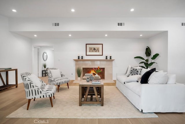1440 Riviera Dr, Pasadena, CA 91107 - living room with recessed lighting, light wood-style floors, and a fireplace