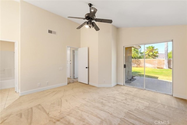 4108 Sunnysage Dr, Jurupa Valley, CA 92509 - unfurnished bedroom with carpet, access to outside, high vaulted ceiling, and connected bathroom