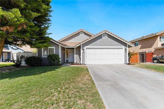 4108 Sunnysage Dr, Jurupa Valley, CA 92509 - single story home with an attached garage, driveway, and a tile roof