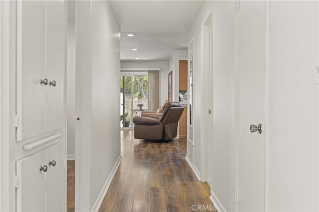 26817 Oak Branch Cir, Newhall, CA 91321 - corridor featuring dark wood-style flooring and recessed lighting
