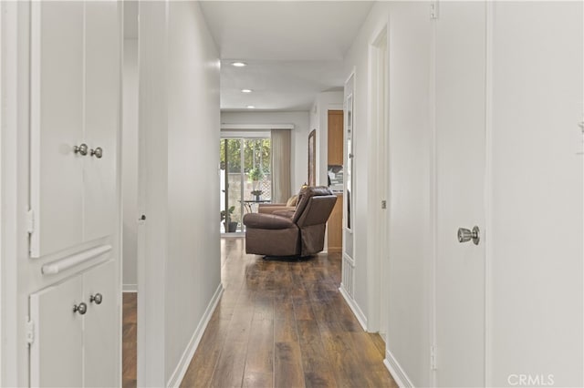 26817 Oak Branch Cir, Newhall, CA 91321 - corridor with dark wood-type flooring and recessed lighting
