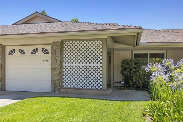 26817 Oak Branch Cir, Newhall, CA 91321 - view of property exterior featuring stone siding, a yard, and an attached garage