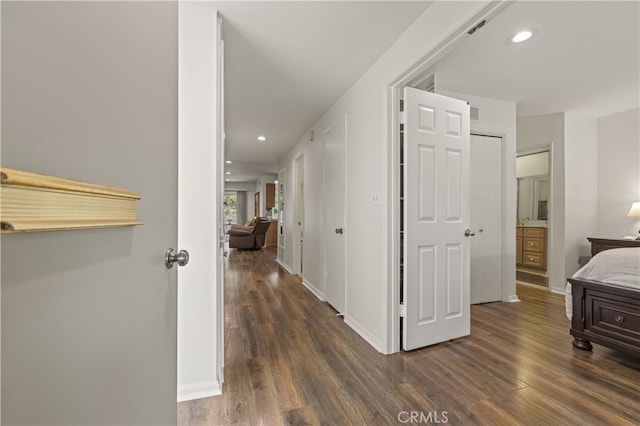 26817 Oak Branch Cir, Newhall, CA 91321 - corridor with dark wood-style flooring and recessed lighting