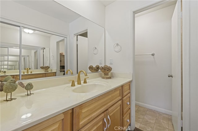 26817 Oak Branch Cir, Newhall, CA 91321 - bathroom with vanity and baseboards