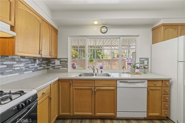 26817 Oak Branch Cir, Newhall, CA 91321 - kitchen with white appliances, decorative backsplash, light countertops, and brown cabinetry