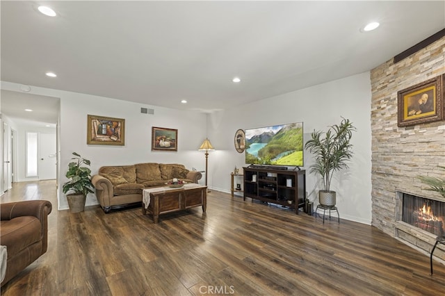 26817 Oak Branch Cir, Newhall, CA 91321 - living room with wood finished floors, recessed lighting, and a fireplace