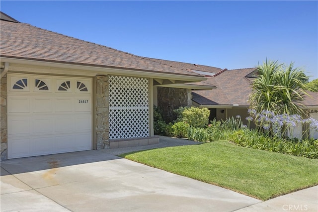 26817 Oak Branch Cir, Newhall, CA 91321 - single story home featuring stone siding, concrete driveway, a shingled roof, a garage, and a front lawn