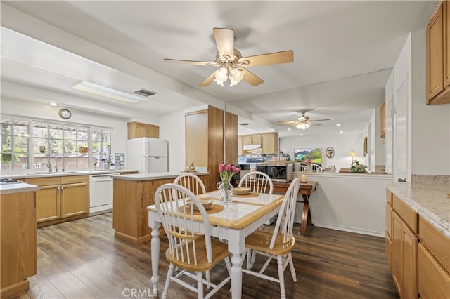 26817 Oak Branch Cir, Newhall, CA 91321 - dining room with ceiling fan, dark wood-style flooring, and healthy amount of natural light