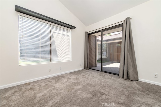 9411 Friendly Woods Ln, Whittier, CA 90605 - unfurnished room featuring vaulted ceiling and carpet
