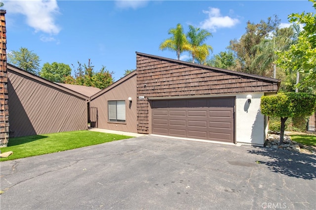 9411 Friendly Woods Ln, Whittier, CA 90605 - view of front of home with an attached garage and driveway