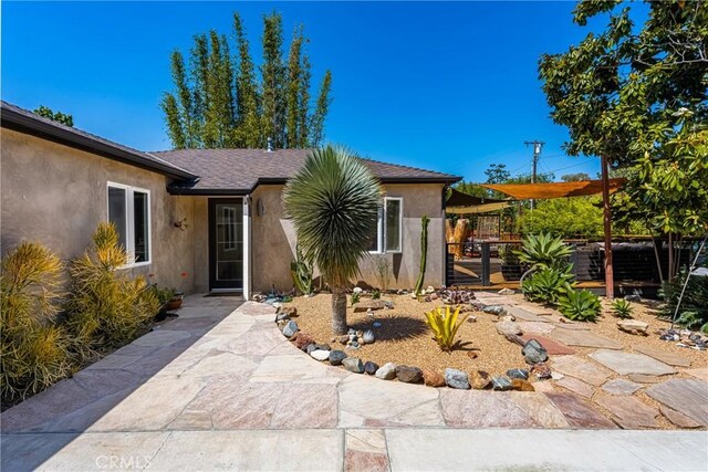 2023 Republic Ave, Costa Mesa, CA 92627 - view of front of home with stucco siding and a gate