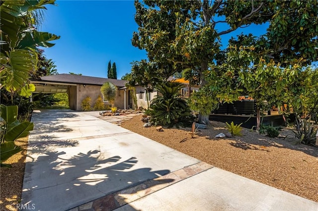 2023 Republic Ave, Costa Mesa, CA 92627 - view of front facade with concrete driveway and stucco siding