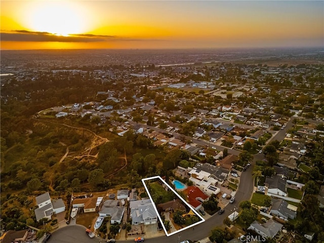 2023 Republic Ave, Costa Mesa, CA 92627 - aerial view at dusk of property boundaries highlighted and a residential view