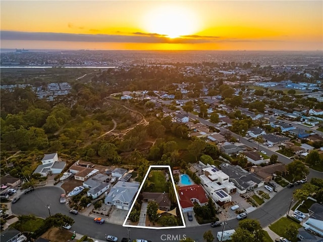 2023 Republic Ave, Costa Mesa, CA 92627 - aerial view at dusk of property boundaries highlighted and a residential view